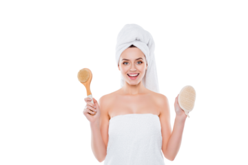 Portrait of positive cheerful woman wrapped in towel with turban on head holding bast and fetlock in hands isolated on white background