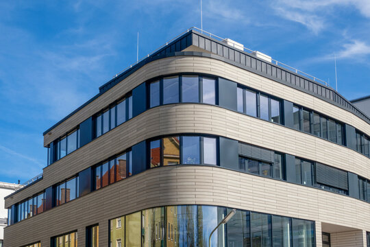 Germany, Bavaria, Munich, Glass facade of modern office building