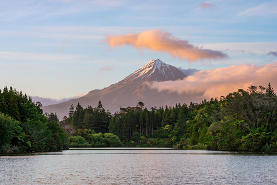 Zew Zealand, North Island, LakeMangamahoeat dawn with MountTaranakiin background