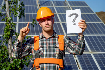 Engineer with Question Mark at Solar Panel Site