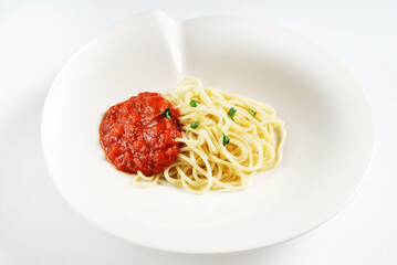 Spaghetti with tomato sauce and basil
