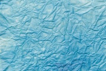 creased blue painted paper texture background