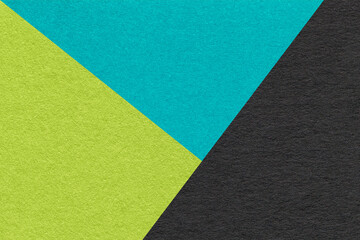 Texture of craft green, turquoise and black paper background, macro. Vintage abstract cerulean...