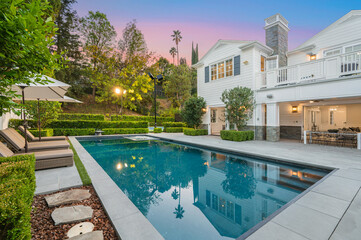 Swimming pool in front of a new construction home in Encino, California