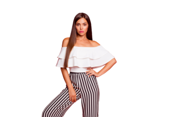 Portrait of tender content calm thin attractive magnificent lovable fascinating lady in striped pants isolated over bright vivid red background