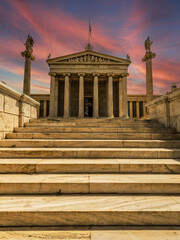 Stairs leading to the  the national university of Athens with Athena and Apollo marble statues...