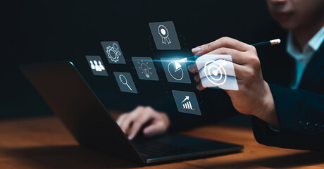 Businessman's Strategic Planning and Creative Thinking, Target Goals and Success with Laptop Icon and Concepts.