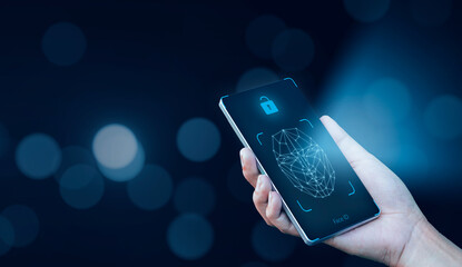 Asian using mobile smartphone scanning  face ID to unlock phone security access with facial recognition technology for biometric identification, future home living luxury tech.