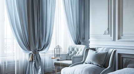 Pale blue curtains with soft gray trim against soft gray walls and pale blue accent furniture pieces.