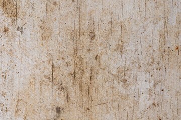 The texture of an old wooden surface covered with white paint