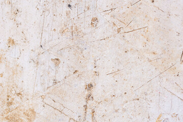 The texture of an old wooden surface covered with white paint
