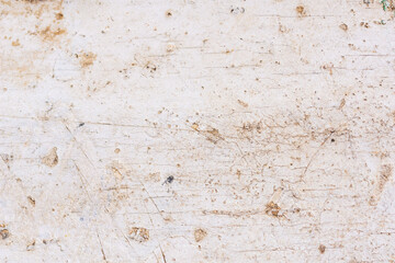 The texture of an old wooden surface covered with white paint