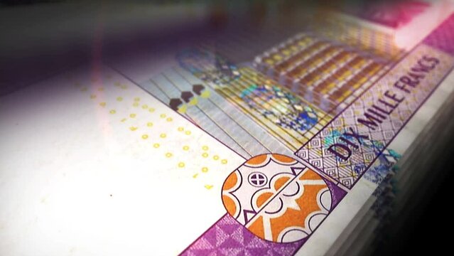Central African CFA Franc money Cameroon Chad Congo Gabon counting. 10000 XAF banknotes. Fast cash note count macro loop. Business, finance and economy. Loopable and seamless concept.