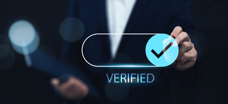 Business technology verification guaranteed good quality service, online trusted application software website digital internet application. Businessman with pen and checked mark.