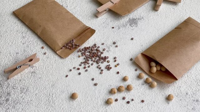 Paper bags with seeds for planting.