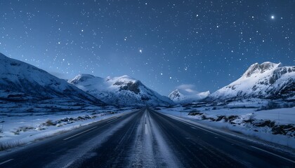 A long road leading to the distance, snow-covered mountains under a starry sky