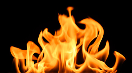 fire on a black background, burning and hot flames, close view