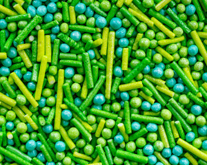 The texture of candy sprinkles.Varied sugar sprinkles, stars, flowers, dots.Holiday treat.Toppings for donuts,cupcake, desserts and ice cream .