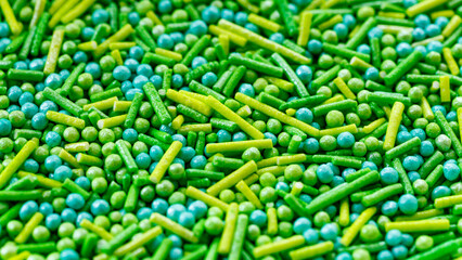 The texture of candy sprinkles.Varied sugar sprinkles, stars, flowers, dots.Holiday treat.Toppings for donuts,cupcake, desserts and ice cream .