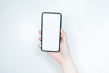 contactless in new normal concept from woman hand hold and smart phone with white isolated background