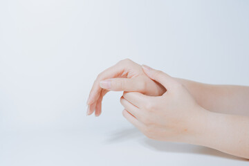 massage hand and finger after pain and ache in office working with white isolated background