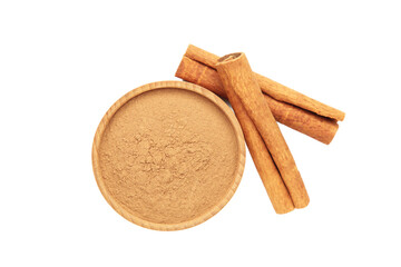 Cinnamon sticks and powder in bowl isolated on white background.