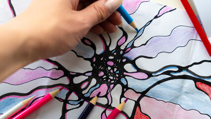 Neurographic art therapy draws intricate patterns, enhancing mindfulness