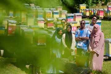 A diverse group of young friends and entrepreneurs explore small honey production businesses in the...