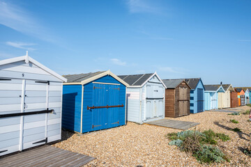 Colourful beach huts during summer on Hayling Island in England