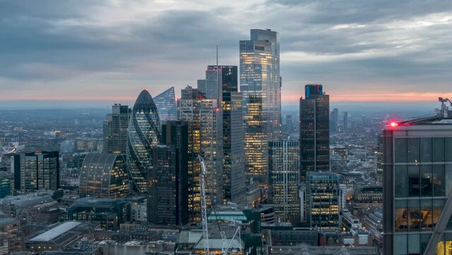 Dusk time lapse view of the corporate skyscrapers at the City of London, England