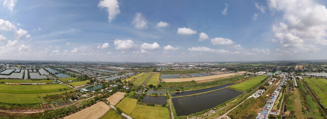 Panoramic drone images of rice fields, villages and the capital.