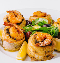 Grilled shrimp and fish fillet gourmet dish