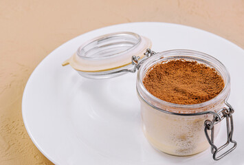 Tiramisu, traditional Italian dessert in a glass