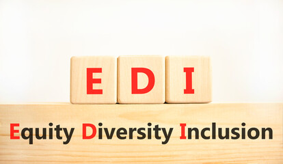 EDI equity diversity inclusion symbol. Concept words EDI equity diversity inclusion on wooden...