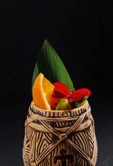 Exotic tiki cocktail mug with tropical garnish