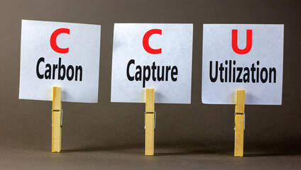 CCU Carbon capture utilization symbol. Concept words CCU Carbon capture utilization on beautiful paper. Beautiful grey background. Business ecological Carbon capture utilization concept. Copy space.