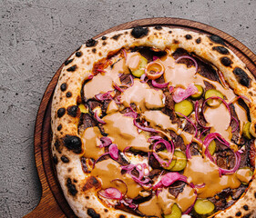 Gourmet vegan pizza on rustic table