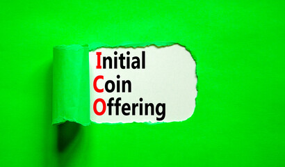ICO initial coin offering symbol. Concept words ICO initial coin offering on beautiful white paper. Beautiful green paper background. Business ICO initial coin offering concept. Copy space.