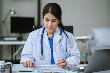 Doctors use a service fee calculator to save money on health insurance, drug cost concepts.