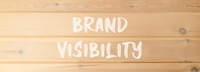 Brand visibility symbol. Concept words Brand visibility on beautiful wooden wall. Beautiful wooden...