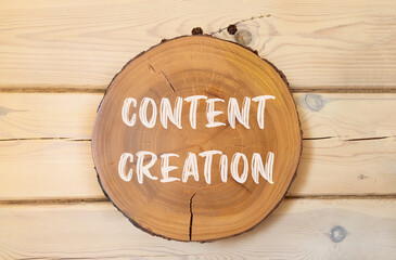 Time for content creation symbol. Concept words Content creation on beautiful wooden circle....