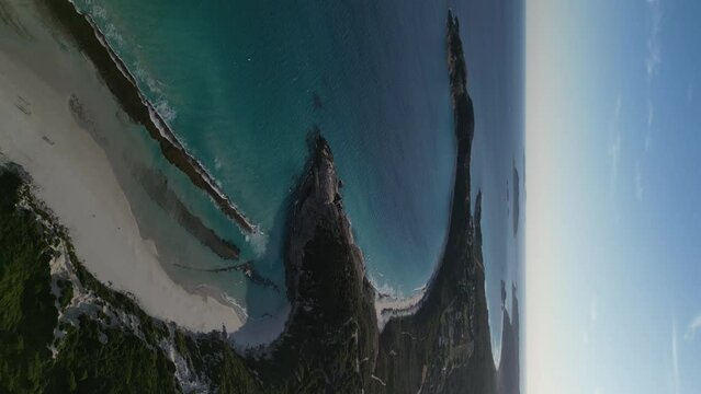 Vertical drone shot of West Beach in Esperance with clear water during sumset- Beautiful Australian coastline. Wide shot.