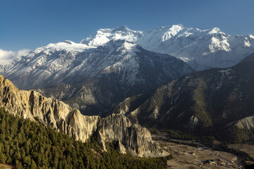 Snow covered peaks and scenic landscape  in Himalayan mountains range valley of the Annapurna...