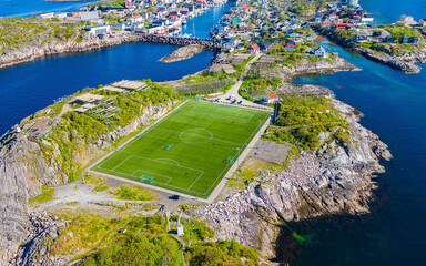 Aerial view of soccer sports field at the Henningsvær archipelago. A fishing village at the...