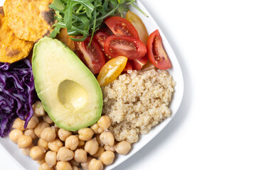 Healthy salad with avocado,lettuce,tomato and chickpeas isolated on white background. Top view....
