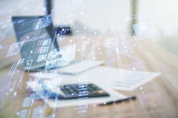 Abstract virtual coding illustration on blurry calculator and computer background, software development concept. Multiexposure