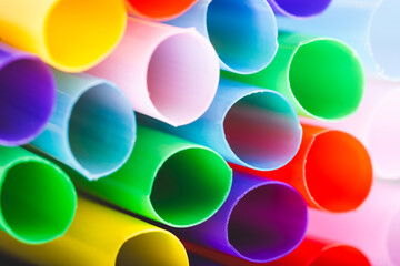 Colorful plastic straws for drinking water, closeup.