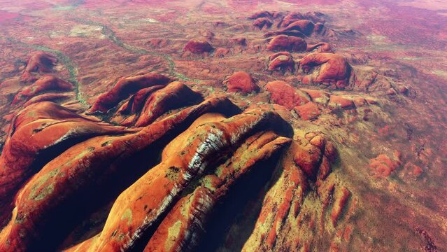 Aerial view of Kata Tju&middot;&pi;&Oslash;a also known as The Olgas is a group of large domed rock formations or bornhardts located about 360 kilometers southwest of Alice Springs 4k high resolution animation