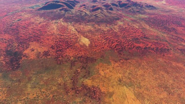 Aerial bird view of Kata Tju&middot;&pi;&Oslash;a also known as The Olgas is a group of large domed rock formations or bornhardts located about 360 kilometers southwest of Alice Springs 4k high resolution animation
