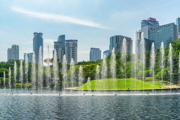 Scenic fountains in a green urban park of Kuala Lumpur